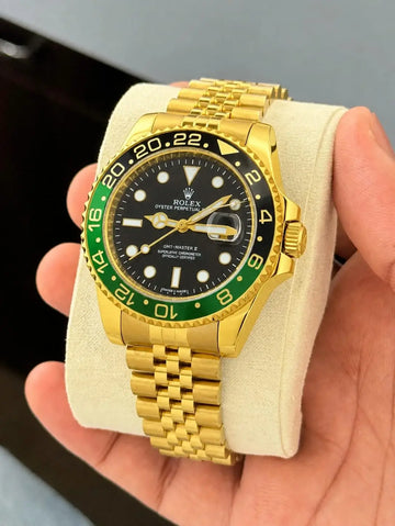 Rolex GMT Green Bazel Gold 